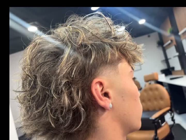 Tapers, fades, and curly cuts at ModCuts