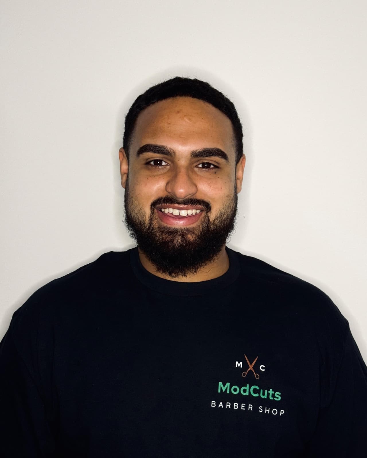 Mikeal, Barber at ModCuts Barbershop